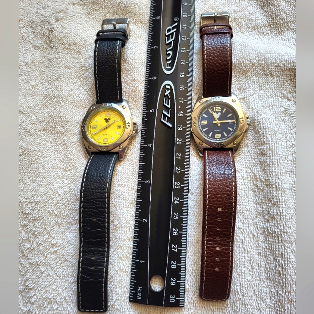 2 Disney watches. Leather bands